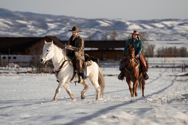 Portrait of couple on horses