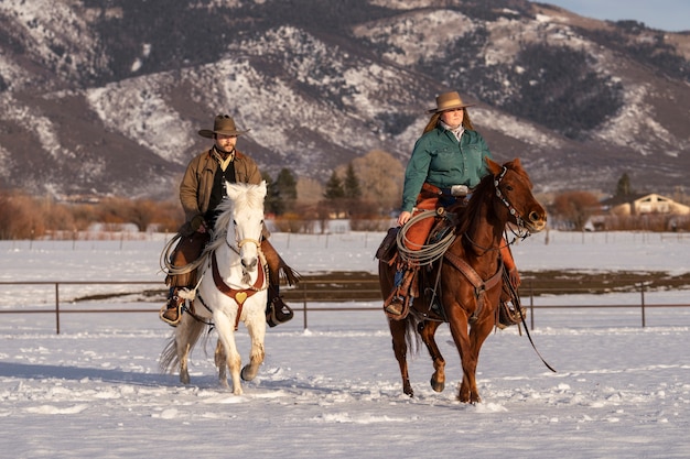 Portrait of couple on horses