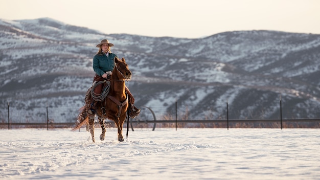 Portrait of cowgirl on a horse