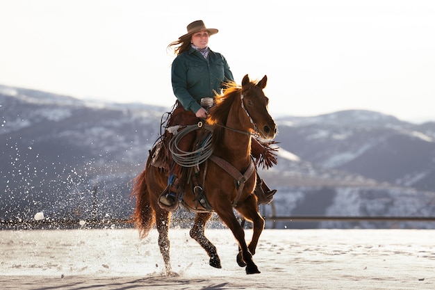 Portrait of cowgirl on a horse