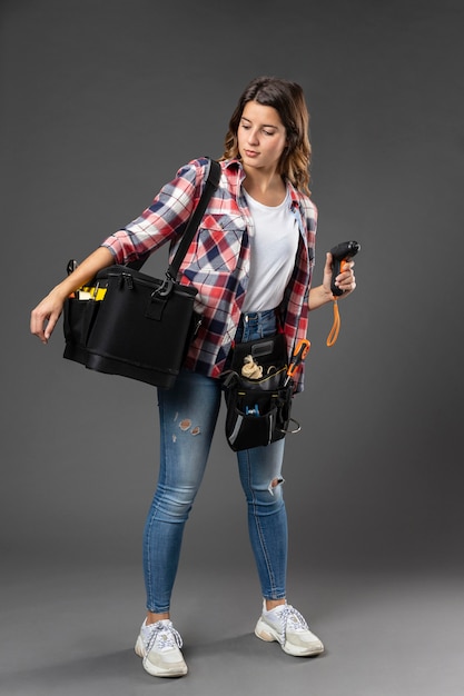 Portrait craft woman with tools