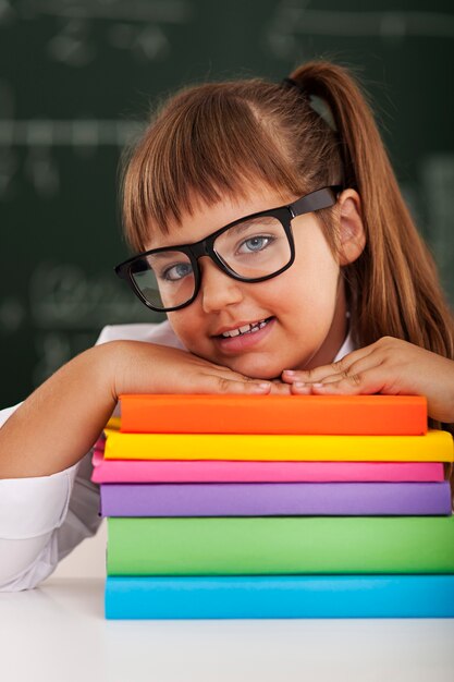 Portrait of cute little schoolgirl