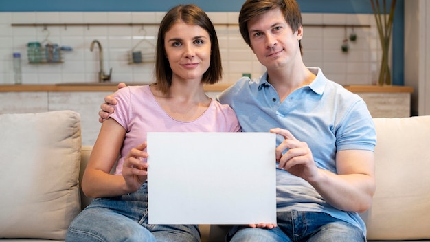 Portrait of cute mother and father together