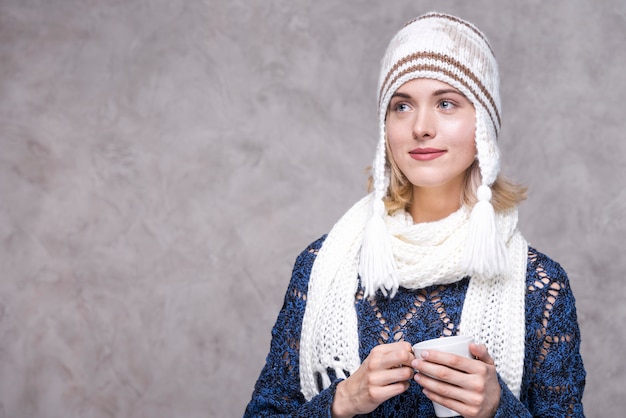 Free Photo portrait of cute young woman with hat