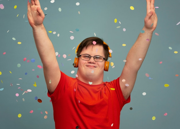 Free Photo portrait of disabled man with soap bubbles