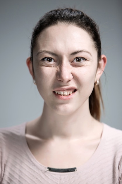 Free photo portrait of disgusted woman