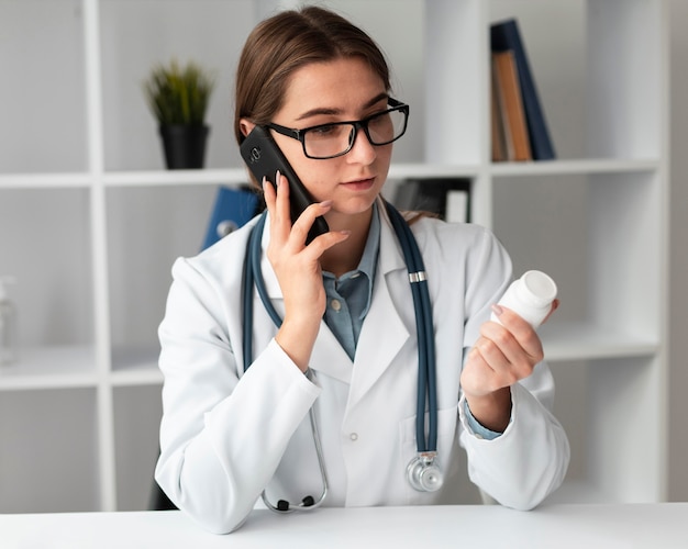 Portrait of doctor talking on the phone