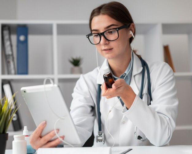 Portrait of doctor video conferencing at the clinic