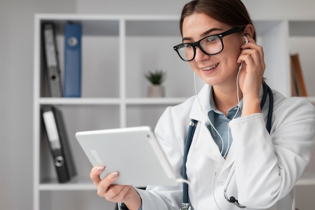 Portrait of doctor video conferencing at the clinic