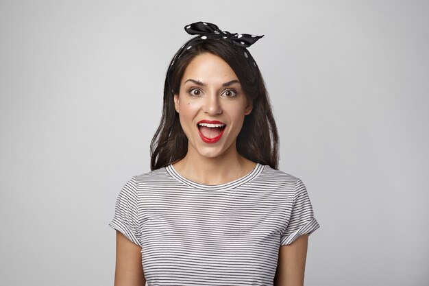 Portrait of an expressive woman posing in the studio