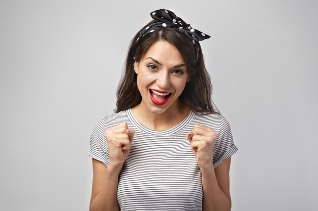 Portrait of an expressive woman posing in the studio