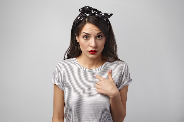 Portrait of an expressive woman posing in the studio