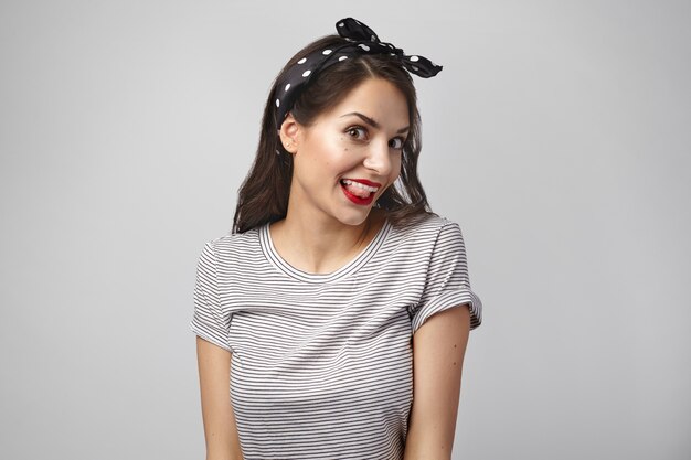 Portrait of an expressive woman posing in the studio