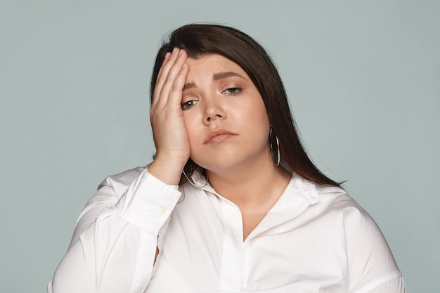 Portrait of an expressive woman in the studio