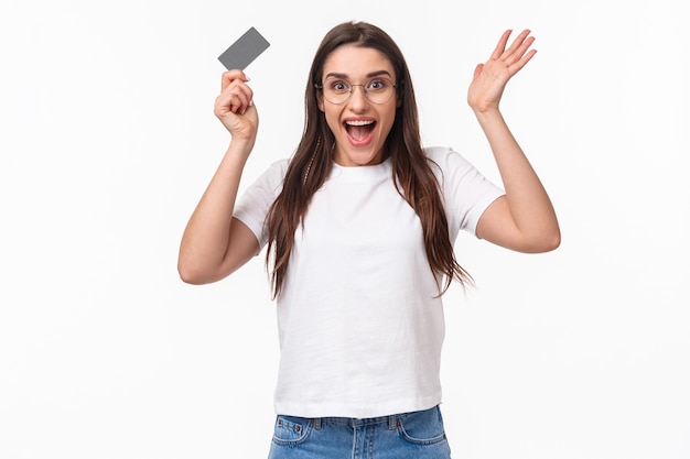 Free Photo portrait expressive young woman with credit card