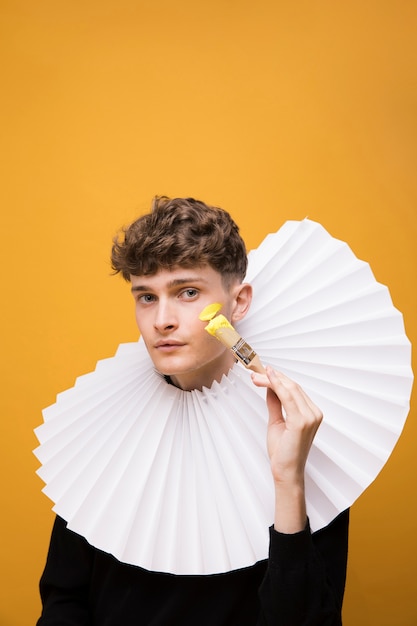 Portrait of fashionable boy wearing a ruff