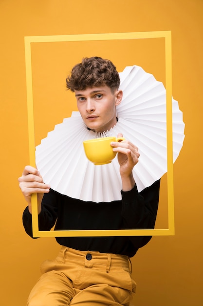 Portrait of fashionable boy wearing a ruff