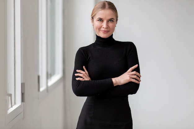 Free Photo portrait female with arms crossed