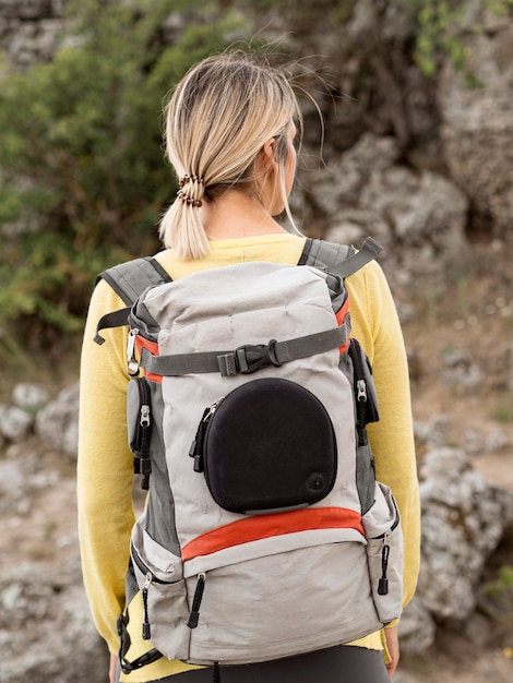 Free Photo portrait female with backpack