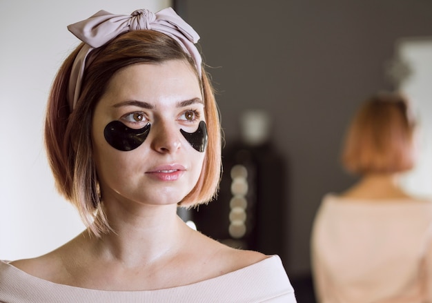 Free photo portrait of female with face mask