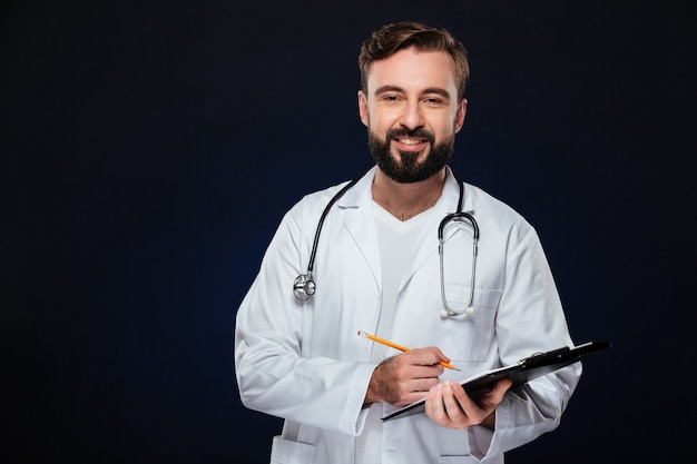 Portrait of a friendly male doctor dressed in uniform