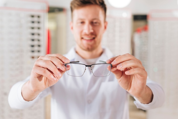 Free Photo portrait of friendly male optometrist