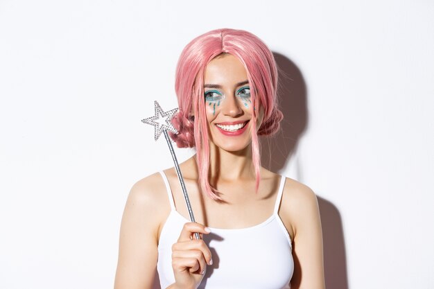 Portrait a girl in a pink short wig