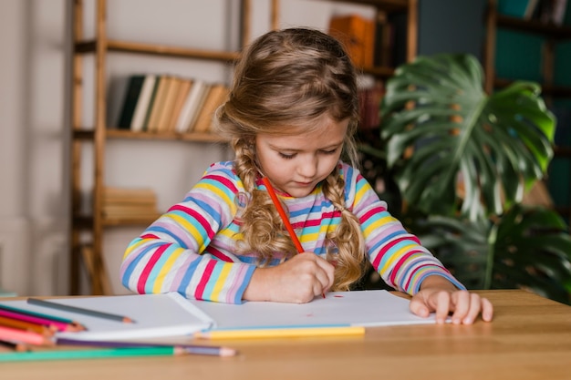 Free photo portrait girl playing