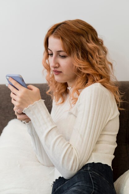 Portrait girl using phone