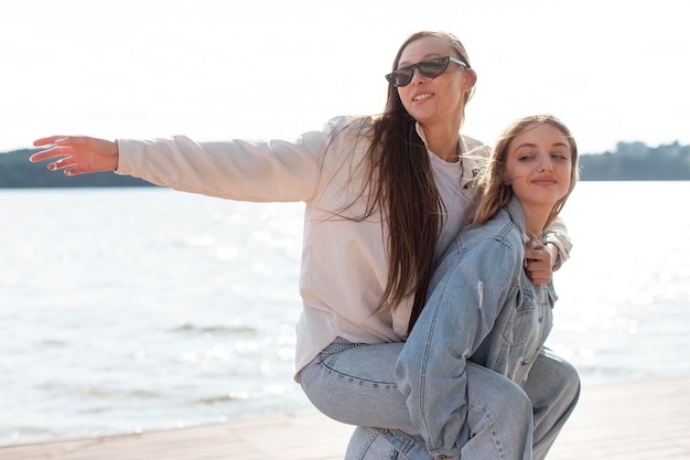 Free photo portrait of girls having fun outdoors