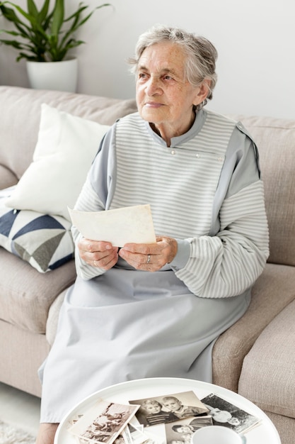 Portrait of grandmother sitting on the couch