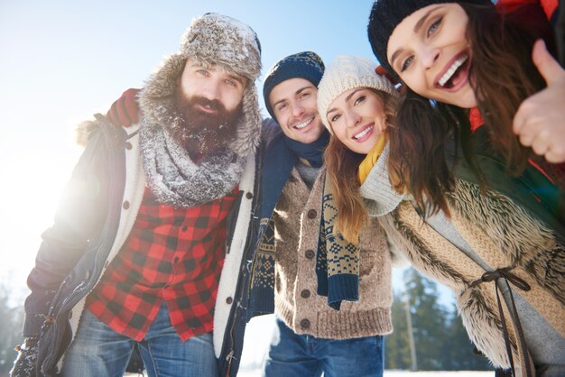 Portrait of group of friends in the snow