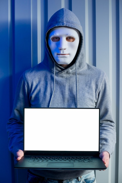 Portrait of hacker with mask