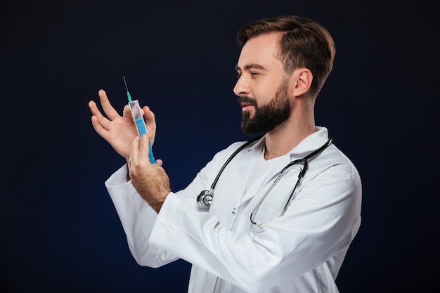 Portrait of a handsome male doctor dressed in uniform