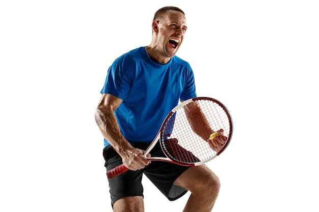 Free photo portrait of a handsome male tennis player celebrating his success isolated on a white  wall. human emotions, winner, sport, victory concept