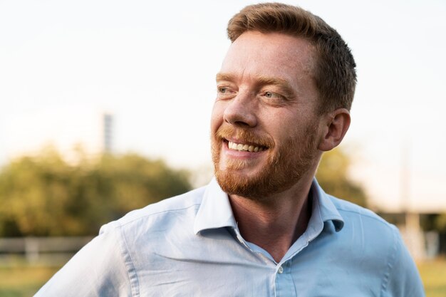 Portrait of handsome man posing outdoors