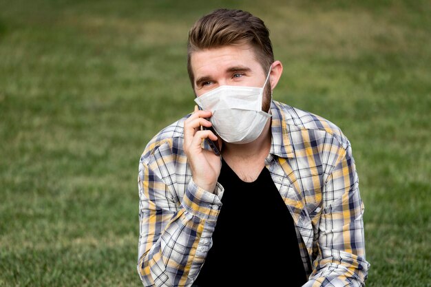 Portrait of handsome man talking on the phone