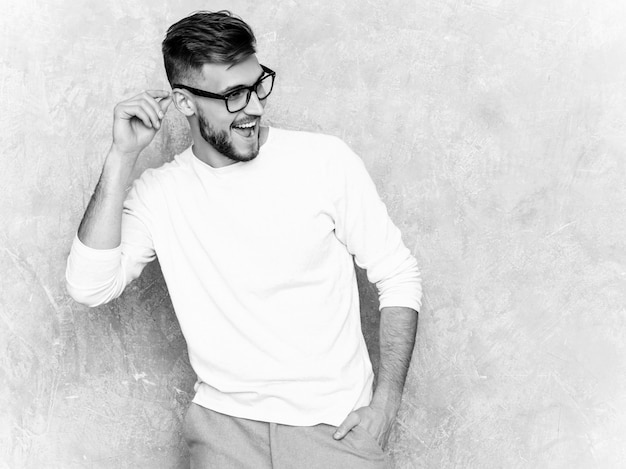 Free photo portrait of handsome smiling hipster   businessman model wearing casual summer white clothes