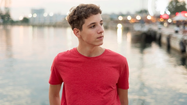 Portrait of handsome young boy looking away