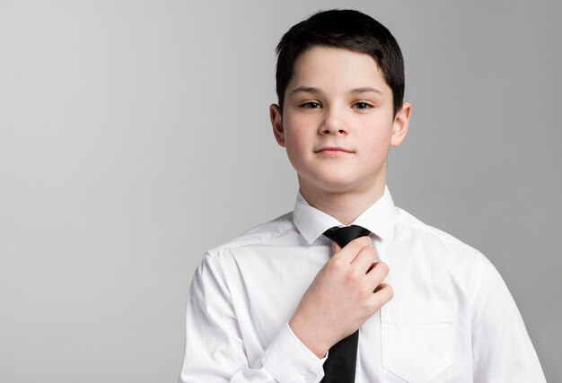 Portrait of handsome young boy posing