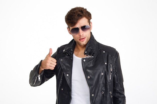 Portrait of a handsome young man in a leather jacket