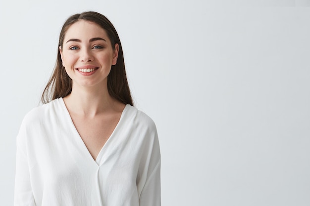 Portrait of happy beautiful young businesswoman smiling .