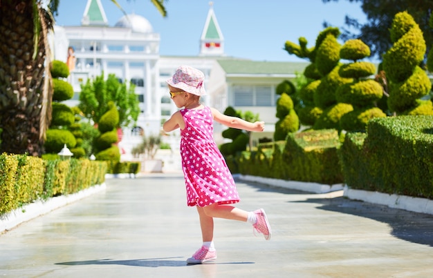 Portrait of a happy child wearing sunglasses outdoors in summer day. Amara Dolce Vita Luxury Hotel. Resort. Tekirova-Kemer. Turkey.