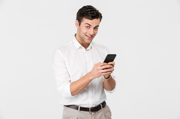 Portrait of a happy excited man in white shirt