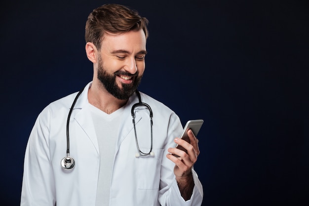 Portrait of a happy male doctor dressed in uniform