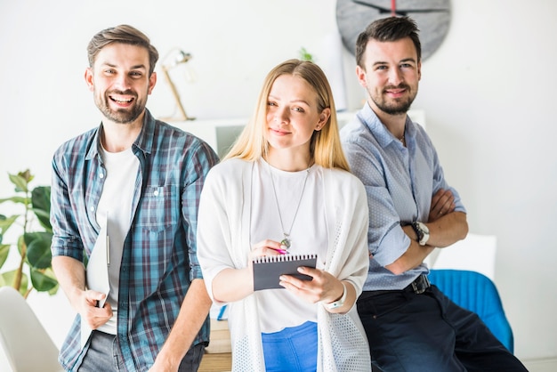 Free photo portrait of happy male and female businesspeople