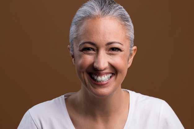 Portrait of happy smiley older woman