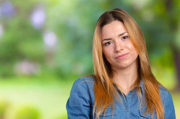 Portrait of happy smiling young beautiful woman