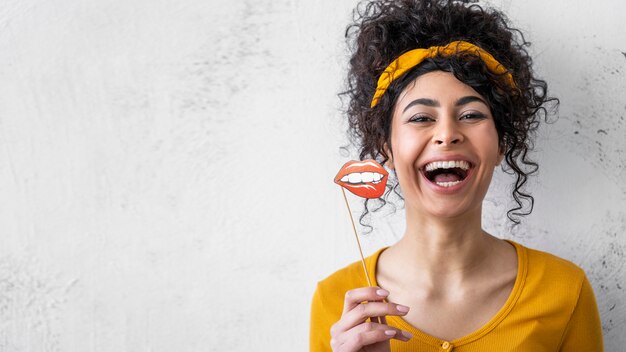 Portrait of happy woman laughing with copy space and mouth