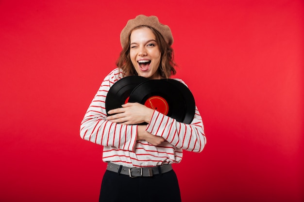 Portrait of a happy woman wearing beret